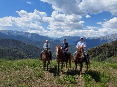 Dave Reed, wife Gerri Anne and son Jackson horseback riding in the San Juan Mountains outside of Ouray, Colorado.